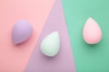 Beauty blender on colorful background. Bright sponges for make-up cosmetics