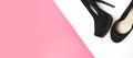 Beauty blog concept. Sexy women black shoes with high-heeled stilettos on a pink background. Royalty Free Stock Photo