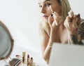 Beauty blogger doing makeup tutorial Royalty Free Stock Photo