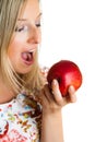 Beauty blond girl with apple Royalty Free Stock Photo