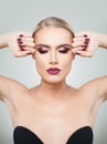 Beauty Blonde Woman with Perfect Professional Holiday Makeup Royalty Free Stock Photo