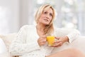 Beauty, blondie woman with a glass of orange juice