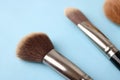 Beauty box, crumbly matte mineral powder with a special brown beautiful wooden brushes from natural nap for makeup Royalty Free Stock Photo