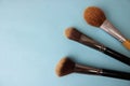 Beauty box, crumbly matte mineral powder with a special brown beautiful wooden brushes from natural nap for makeup Royalty Free Stock Photo