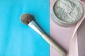 Beauty box, crumbly matte mineral powder with a special brown beautiful wooden brush from natural nap for makeup Royalty Free Stock Photo