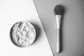 Beauty box, crumbly matte mineral powder with a special brown beautiful wooden brush from natural nap for makeup Royalty Free Stock Photo