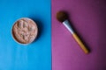 Beauty box, crumbly matte mineral powder with a special brown beautiful wooden brush from natural nap for makeup Royalty Free Stock Photo