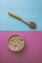 Beauty box, crumbly matte mineral powder with a special brown beautiful wooden brush from natural nap for makeup Royalty Free Stock Photo