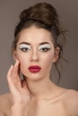 Beauty brunette woman with perfect makeup. Beautiful professional holiday makeup Royalty Free Stock Photo