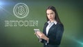 Beauty business woman standing near btc logo. Succesful Bitcoin investment. Concept of virtual criptocurrency.