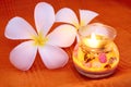Beauty candle with frangipani Royalty Free Stock Photo