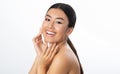 Beauty care. Asian woman touching soft face skin Royalty Free Stock Photo