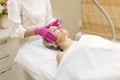 Beauty clinic, skin preparation for mesotherapy, biorevitalization, hands in gloves close-up
