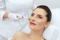 Beauty Clinic. Woman Doing Face Skin Cryo Oxygen Treatment Royalty Free Stock Photo