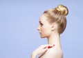 Beauty close-up portrait of beautiful, fresh and healthy girl over blue background. Royalty Free Stock Photo