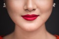 Beauty. Close up view of beautiful woman lips with red matt lips Royalty Free Stock Photo