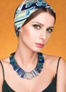 Beauty closeup portrait of beautiful young woman in a headscarf Royalty Free Stock Photo