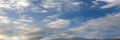 Beauty cloud against a blue sky background. Clouds sky. Blue sky with cloudy weather, nature cloud. White clouds, blue sky and sun Royalty Free Stock Photo