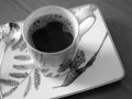 Beauty coffeecup standing on wooden table with dark tasty coffee Royalty Free Stock Photo