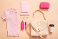 Beauty concept in a blog. Professional female make-up accessories, watch, bracelet, lipstick, powder, on a pink background. Women