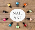 Beauty concept - Bright colorful bottles with gel-varnish for covering nails and text nail art Royalty Free Stock Photo