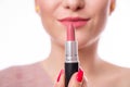 Beauty concept. Portrait of model with rose lips painted with lip gloss. Lips Protection Royalty Free Stock Photo