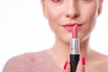 Beauty concept. Portrait of model with rose lips painted with lip gloss. Lips Protection. Royalty Free Stock Photo