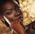 Beauty concept: Portrait of a sensual young African woman with colored make up Royalty Free Stock Photo
