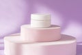 Beauty cosmetic cream jar mockup on purple podium pedestal showcase. Blank skin care product template, luxury skincare