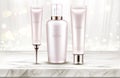 Beauty cosmetics bottles line on marble table top Royalty Free Stock Photo