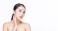 Beauty, cosmetics, healthy, treatment, skincare and spa concept. Asian young woman touching own face with clear fresh skin. Royalty Free Stock Photo