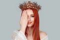 Beauty crowned queen girl woman miss bride hand on, covering face showing manicure gel art nails pretty woman hand on face with Royalty Free Stock Photo