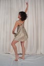 Beauty dance with fluttering skirt. Golden play.