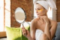 Beauty Day. Woman doing her daily skincare routine at home Royalty Free Stock Photo