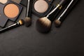 Beauty essentials Makeup brush and palette on a black background