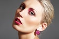 Beauty with evening make-up, bright lips & jewelry