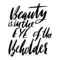 Beauty is in the eye of the beholder. Hand drawn lettering proverb. Vector typography design. Handwritten inscription. Royalty Free Stock Photo