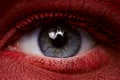 Beauty eye with dark red paint on skin Royalty Free Stock Photo