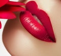 Beauty face closeup. lips. Beauty red lip makeup detail. Beautiful make-up close-up Royalty Free Stock Photo