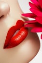 Beauty face closeup. lips. Beauty red lip makeup detail. Beautiful make-up close-up Royalty Free Stock Photo