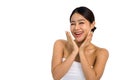 Beauty face. Happy beautiful girl holding her cheeks with a laugh. Young pretty asian woman clean fresh skin. Expressive facial Royalty Free Stock Photo