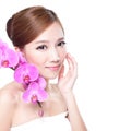 Beauty face with orchids Royalty Free Stock Photo