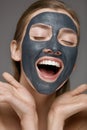 Beauty face skin care. Woman with cosmetic spa facial mask Royalty Free Stock Photo