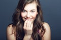 Beauty, face and skin portrait of a woman in studio with a smile, makeup and cosmetics. Headshot of a happy gen z female