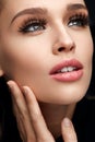 Beauty Face. Woman With Makeup, Soft Skin And Long Eyelashes Royalty Free Stock Photo