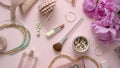 Beauty and fashion accessories and gadgets. Femine concept. Flat lay on pink theme background