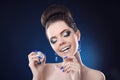 Beauty Fashion makeup and manicure nails. Smiling girl with cute Royalty Free Stock Photo