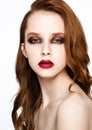 Beauty fashion model ginger hair and red makeup Royalty Free Stock Photo