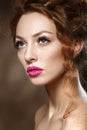 Beauty Fashion Model Girl with Curly Red Hair, Long Eyelashes. Royalty Free Stock Photo