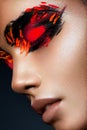 Beauty fashion model girl with dark bright orange make-up